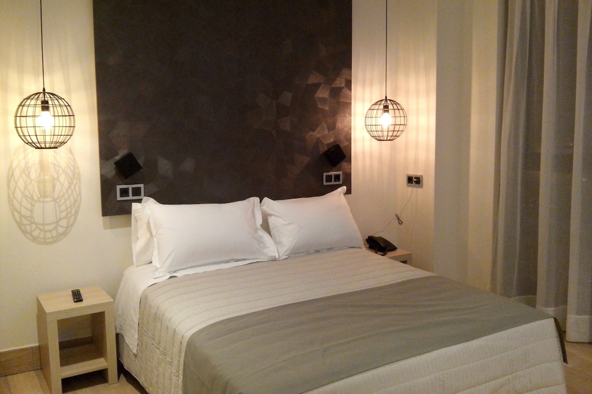 Desk, blackout curtains, soundproofing, iron/ironing board