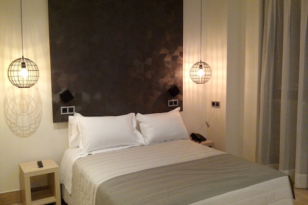 Desk, blackout curtains, soundproofing, iron/ironing board