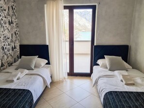Deluxe Apartment, 2 Bedrooms, Terrace, Sea View | Individually decorated, individually furnished, desk, iron/ironing board - Step to Kotor bay Stoliv (Donji Stoliv)