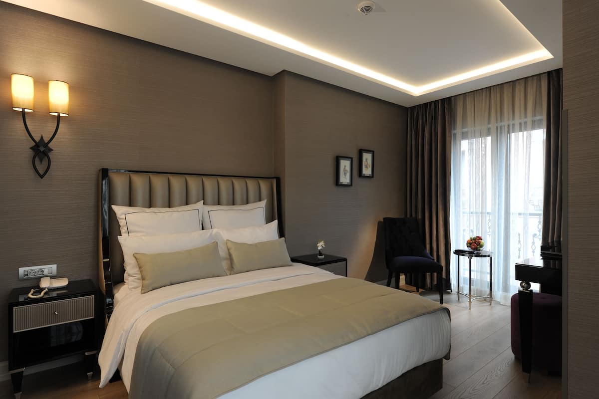 Deluxe dubbelrum | Sängtillbehör av högsta kvalitet och minibar