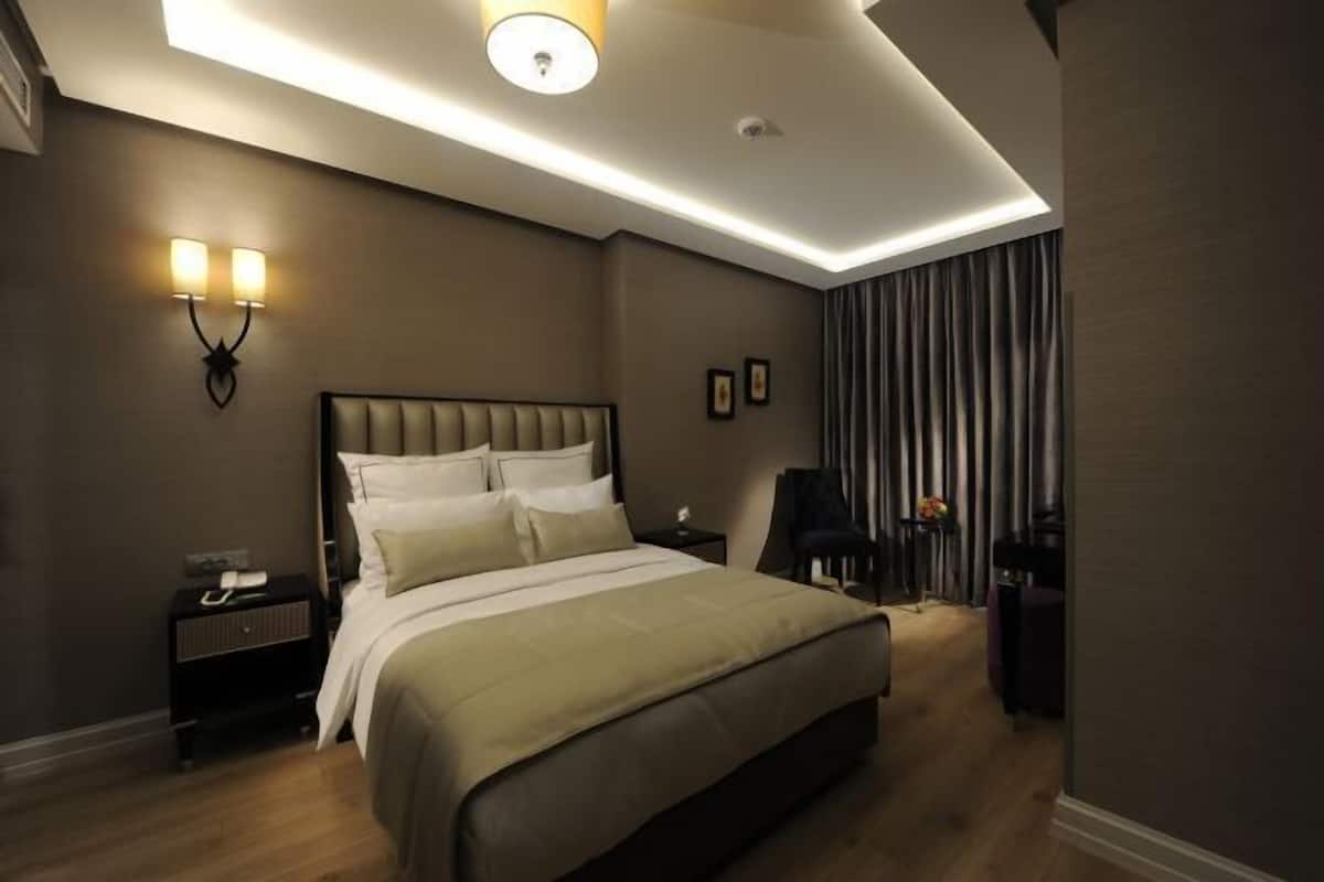 1 Schlafzimmer, hochwertige Bettwaren, Minibar, Zimmersafe