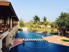 Outdoor pool, pool umbrellas, sun loungers