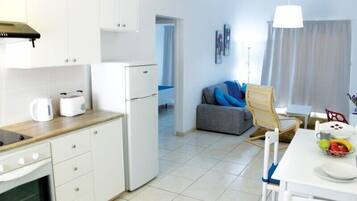 Familie appartement, 2 slaapkamers | Woonruimte | Een lcd-televisie