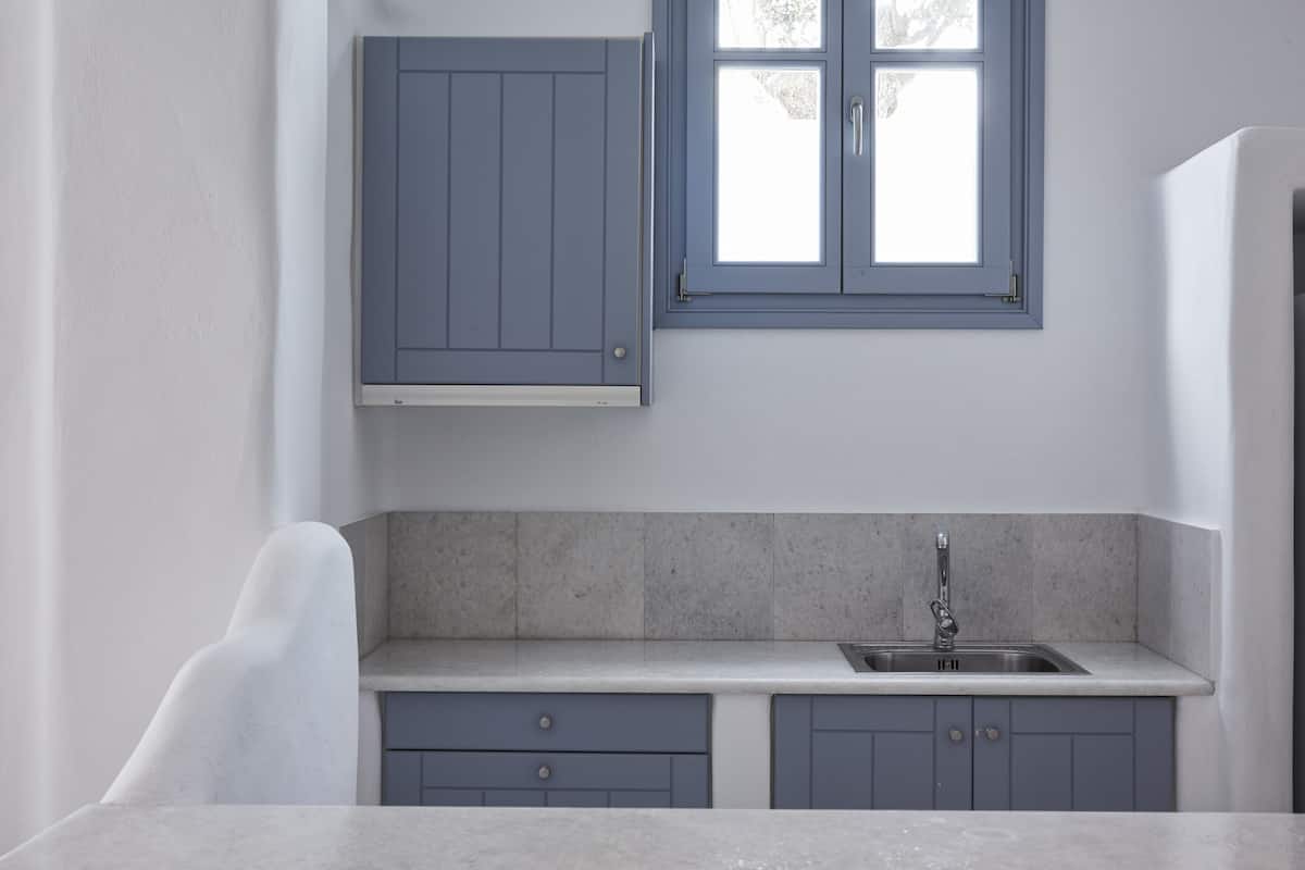 white votsalo studio (semi - based with indoor garden) | living area | 32-inch flat-screen tv with cable channels, tv