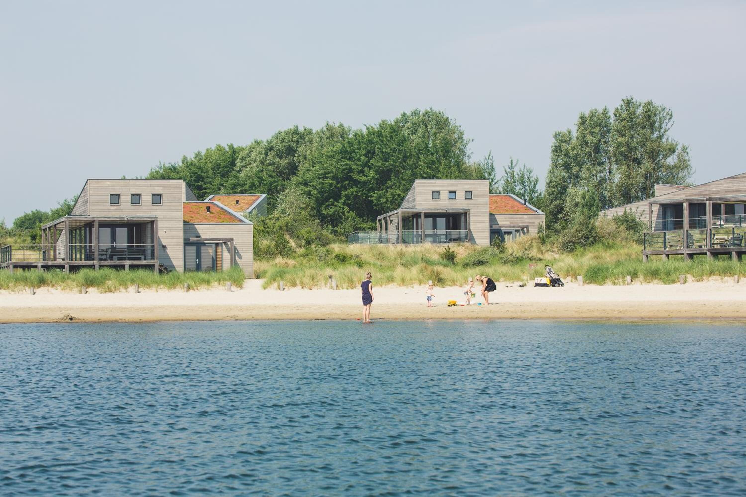On the beach, white sand, beach cabanas