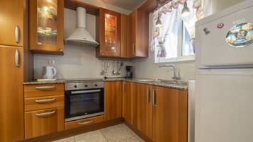 Maison Premium, 2 chambres, vue baie, vue mer | Cuisine privée | Réfrigérateur, plaque de cuisson, cafetiÚre/bouilloire