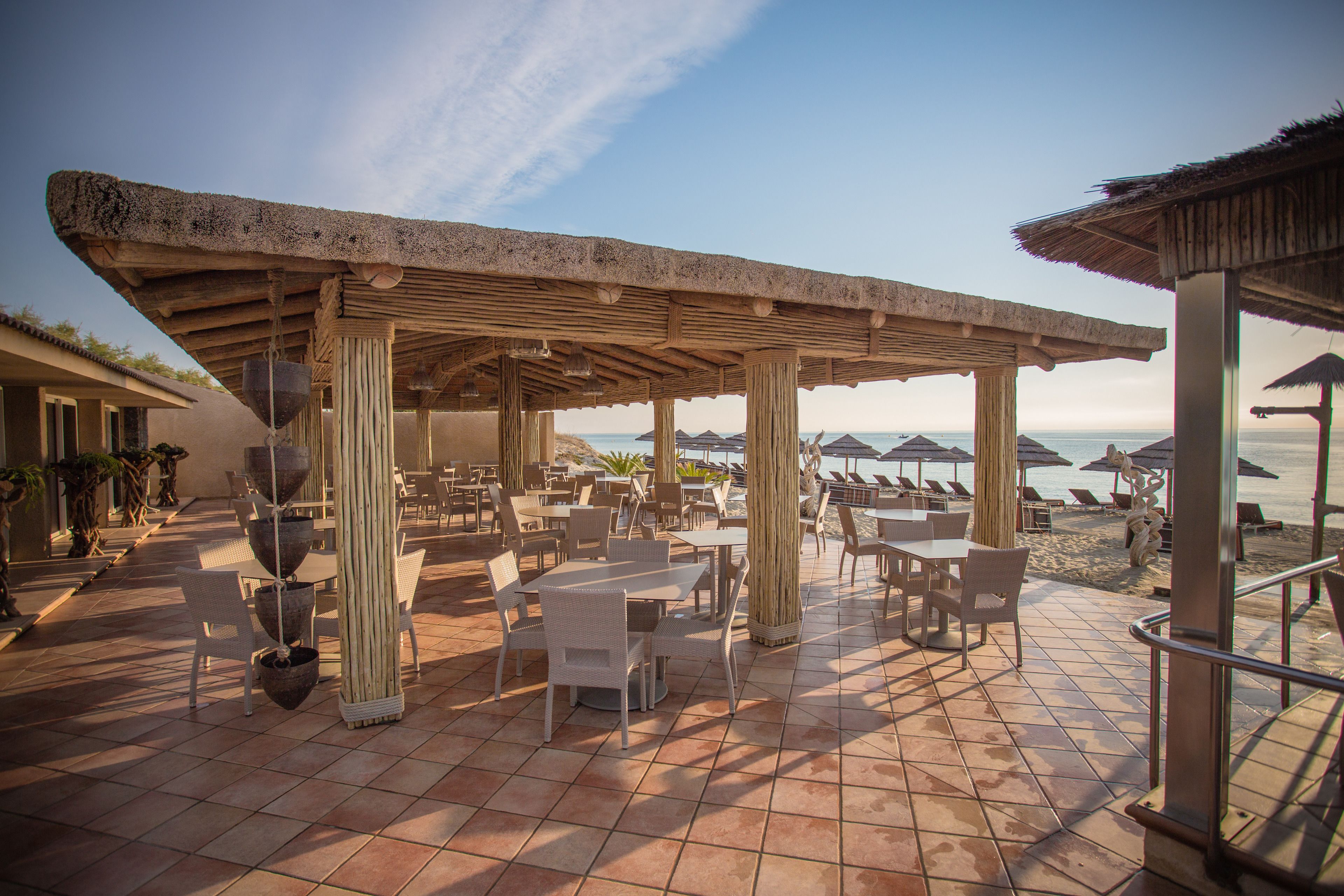 Lunch, dinner served; French cuisine, beach views 