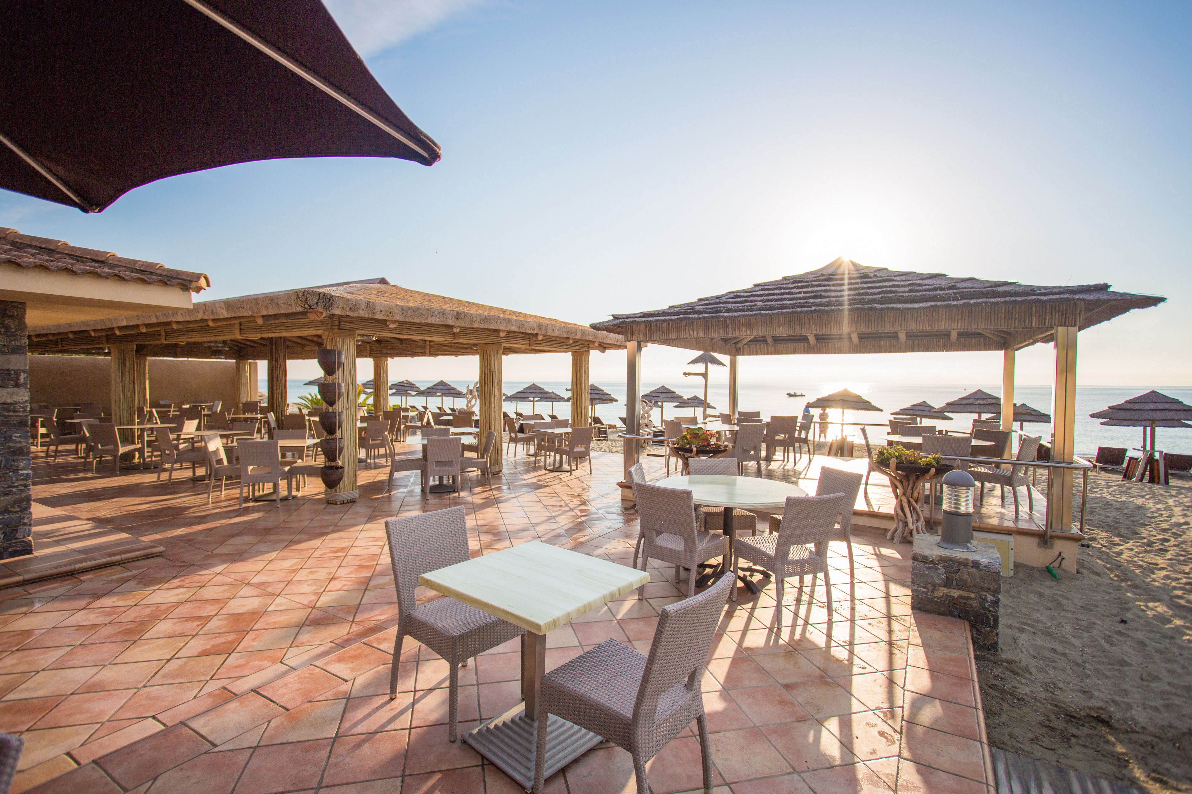 Lunch, dinner served; French cuisine, beach views 