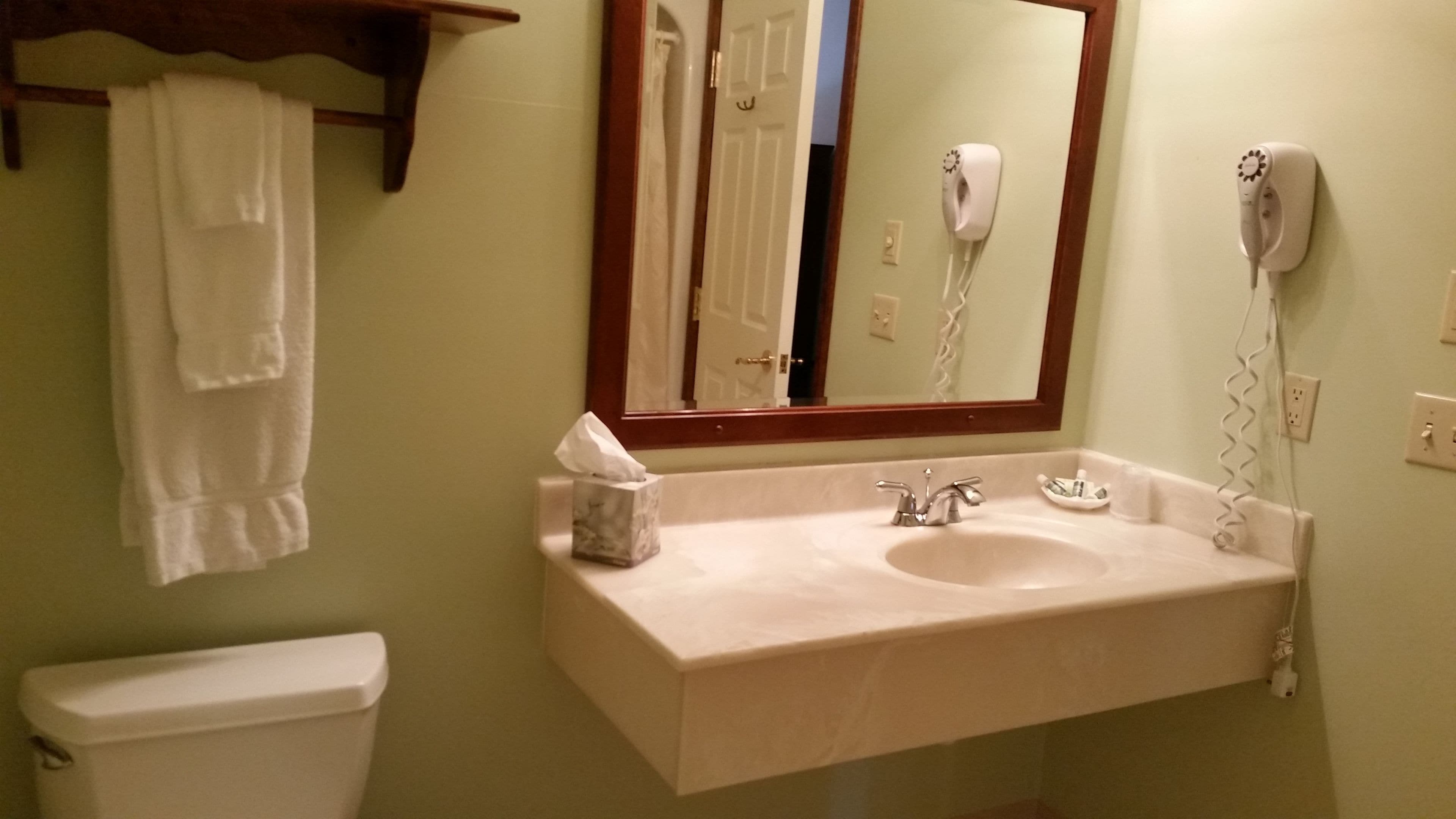 standard room, 2 queen beds, non smoking | bathroom | combined shower/bathtub, free toiletries, hair dryer, towels