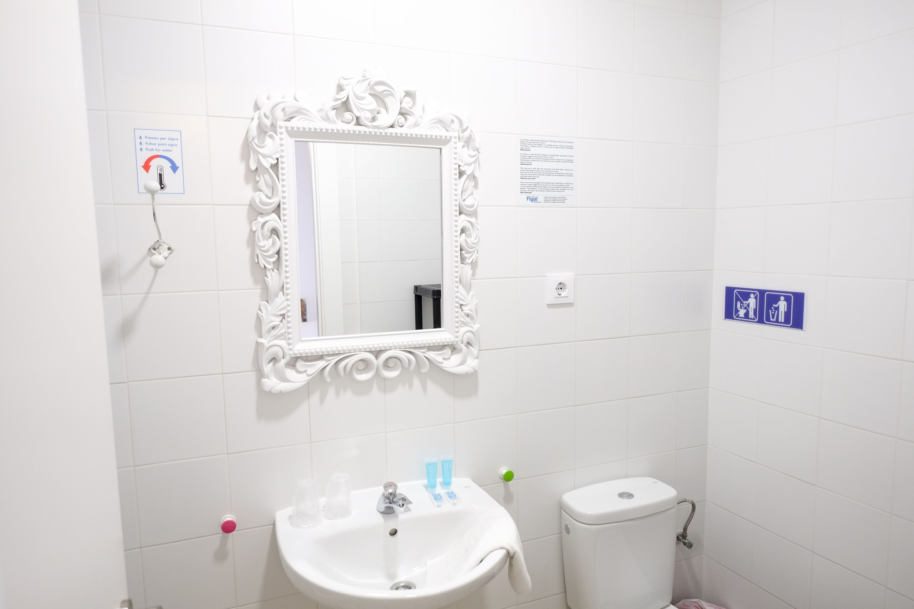 shower, designer toiletries, hair dryer, towels