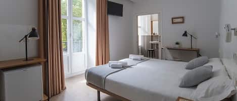 Deluxe Double Room, Balcony | Minibar, in-room safe, desk, laptop workspace