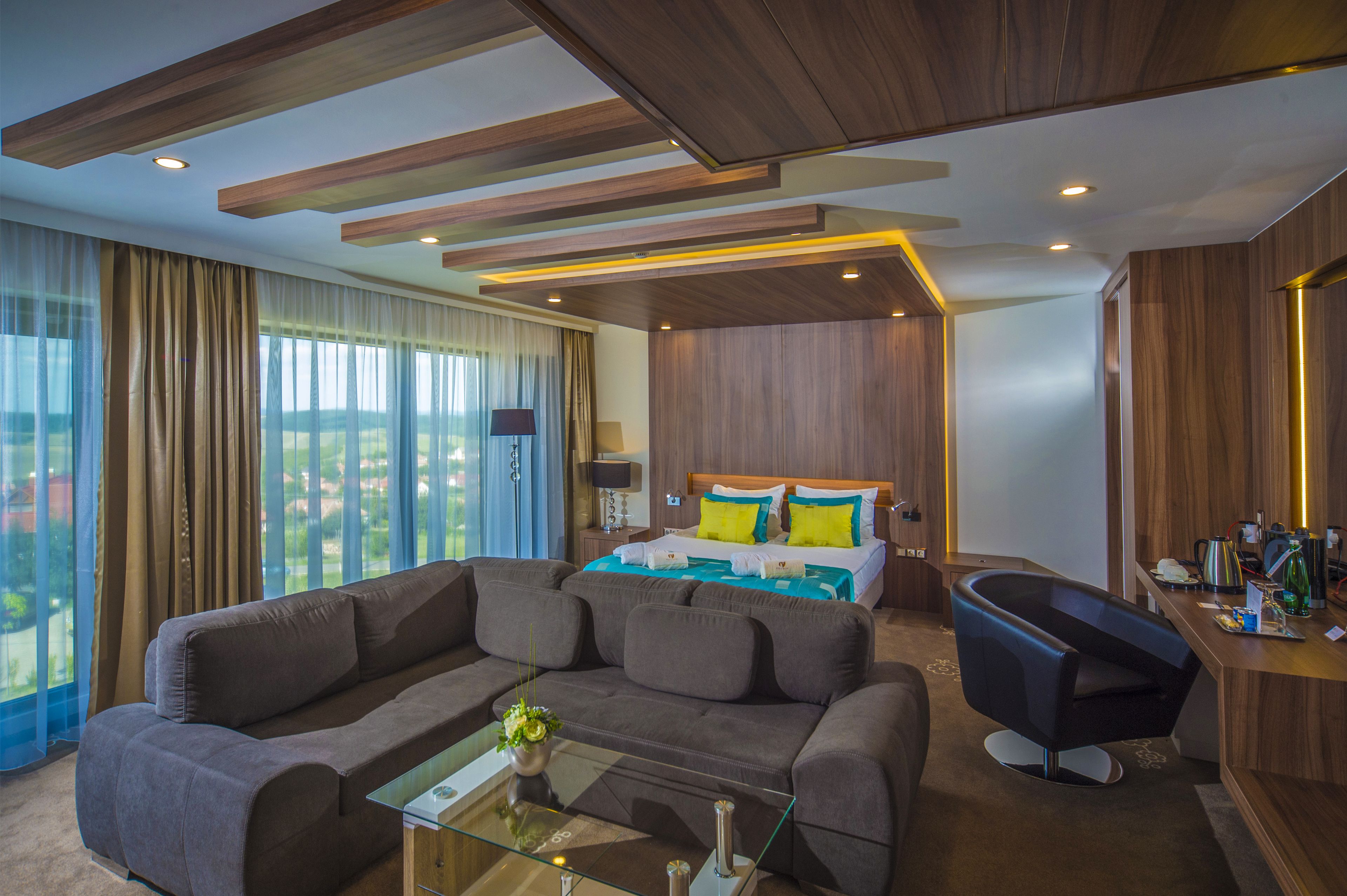 family suite, multiple beds, fireplace | living area | flat-screen tv