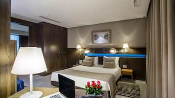 Junior Suite | Premium bedding, minibar, in-room safe, blackout curtains