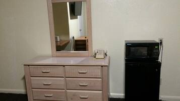 Desk, blackout drapes, iron/ironing board, free cribs/infant beds