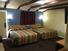 Room, 2 Queen Beds | Desk, blackout drapes, iron/ironing board, free cribs/infant beds