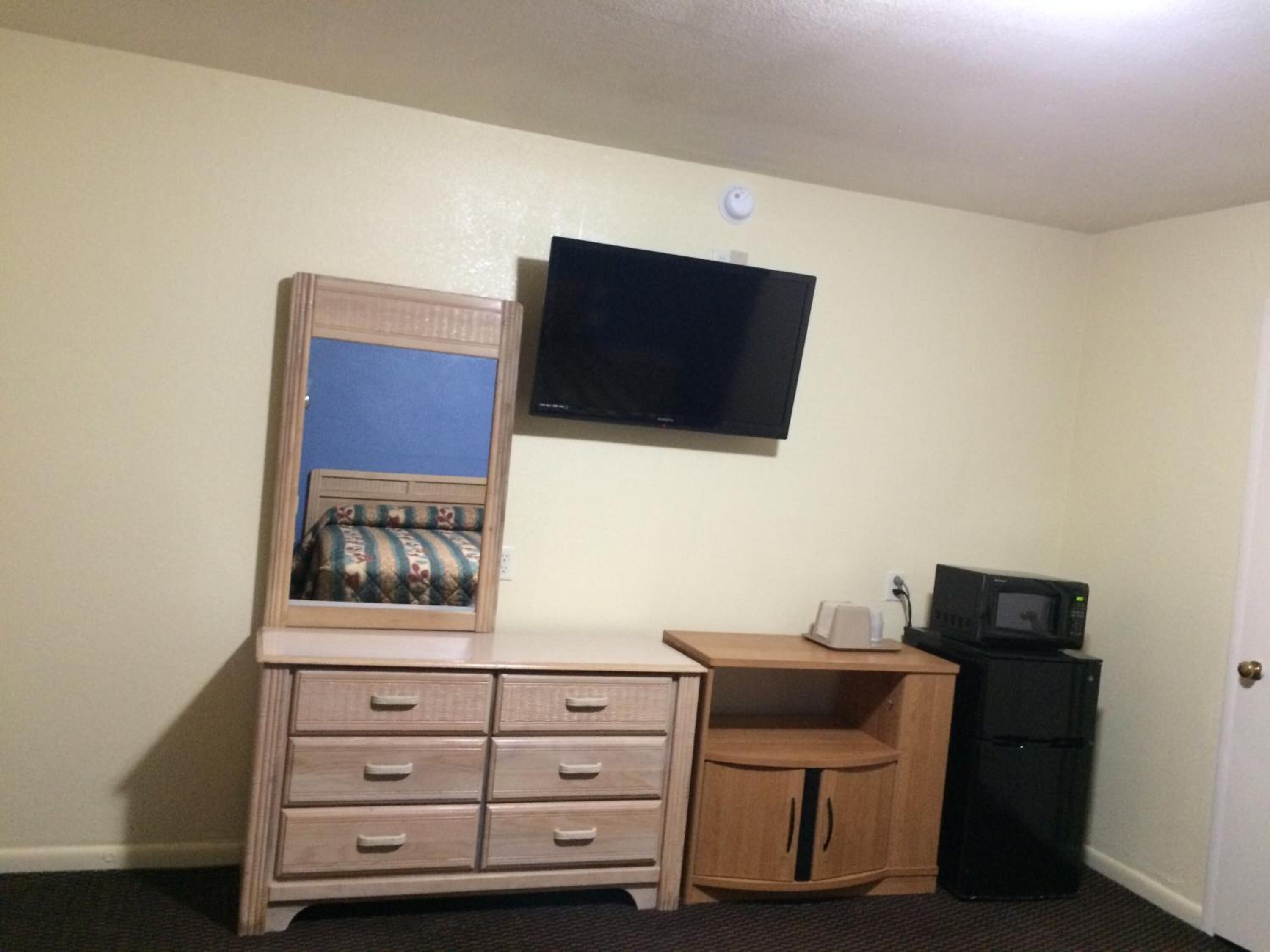 desk, blackout curtains, iron/ironing board, free cots/infant beds