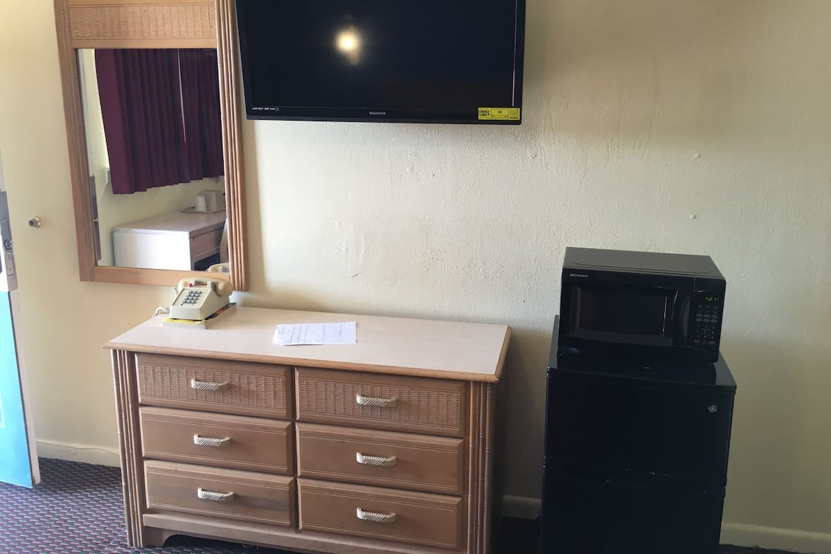 Room, 2 Queen Beds | Desk, blackout drapes, iron/ironing board, free cribs/infant beds