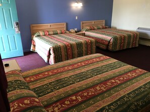 Room, 3 Queen Beds | Desk, blackout drapes, iron/ironing board, free cribs/infant beds