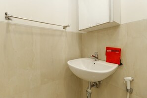 Quarto casal | Pia do banheiro