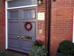 Welcome to Ogilvy House, where a charming entrance sets the tone for a memorable stay.