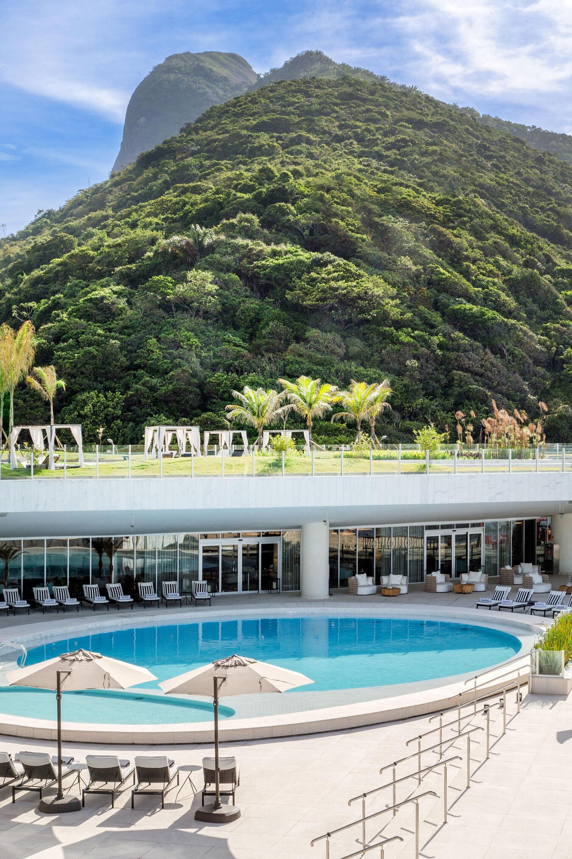 Outdoor pool, pool umbrellas, sun loungers