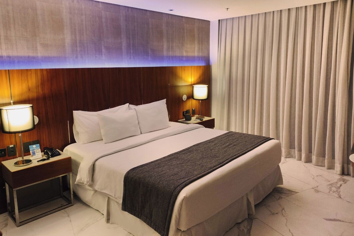 Premium bedding, pillow-top beds, minibar, in-room safe