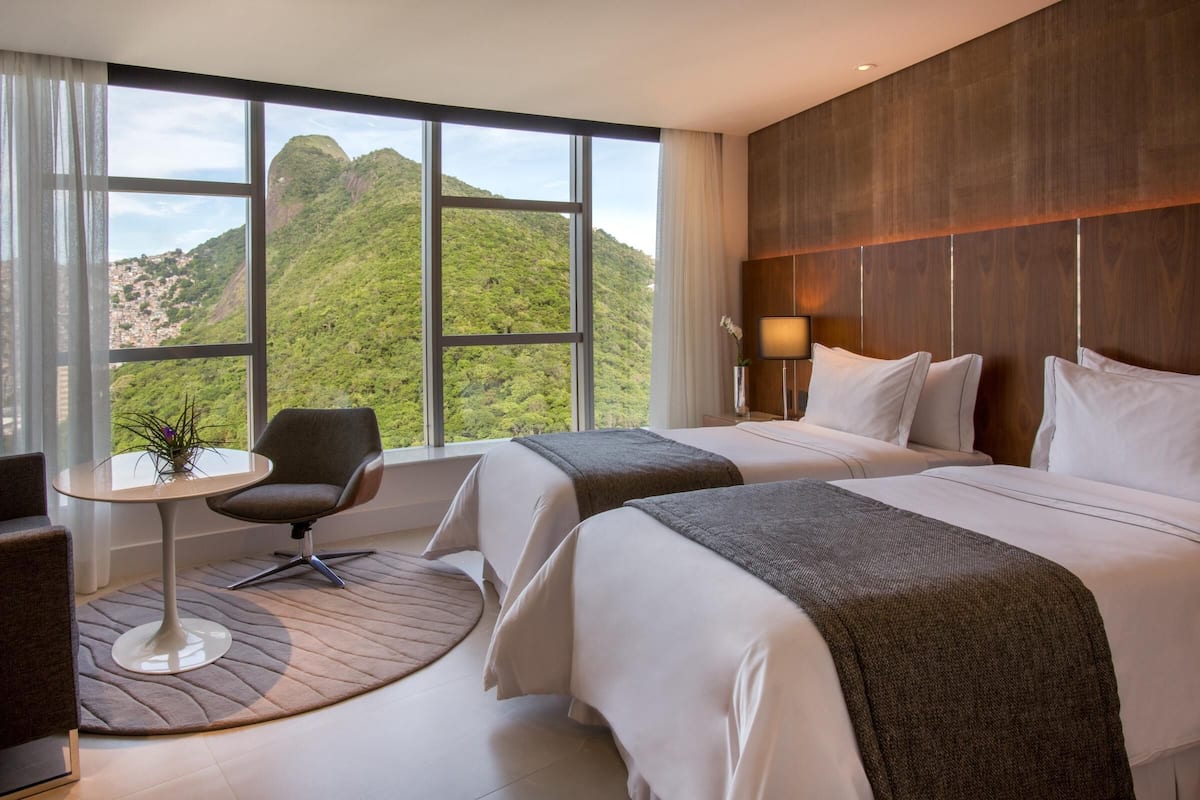 Premium bedding, pillow-top beds, minibar, in-room safe