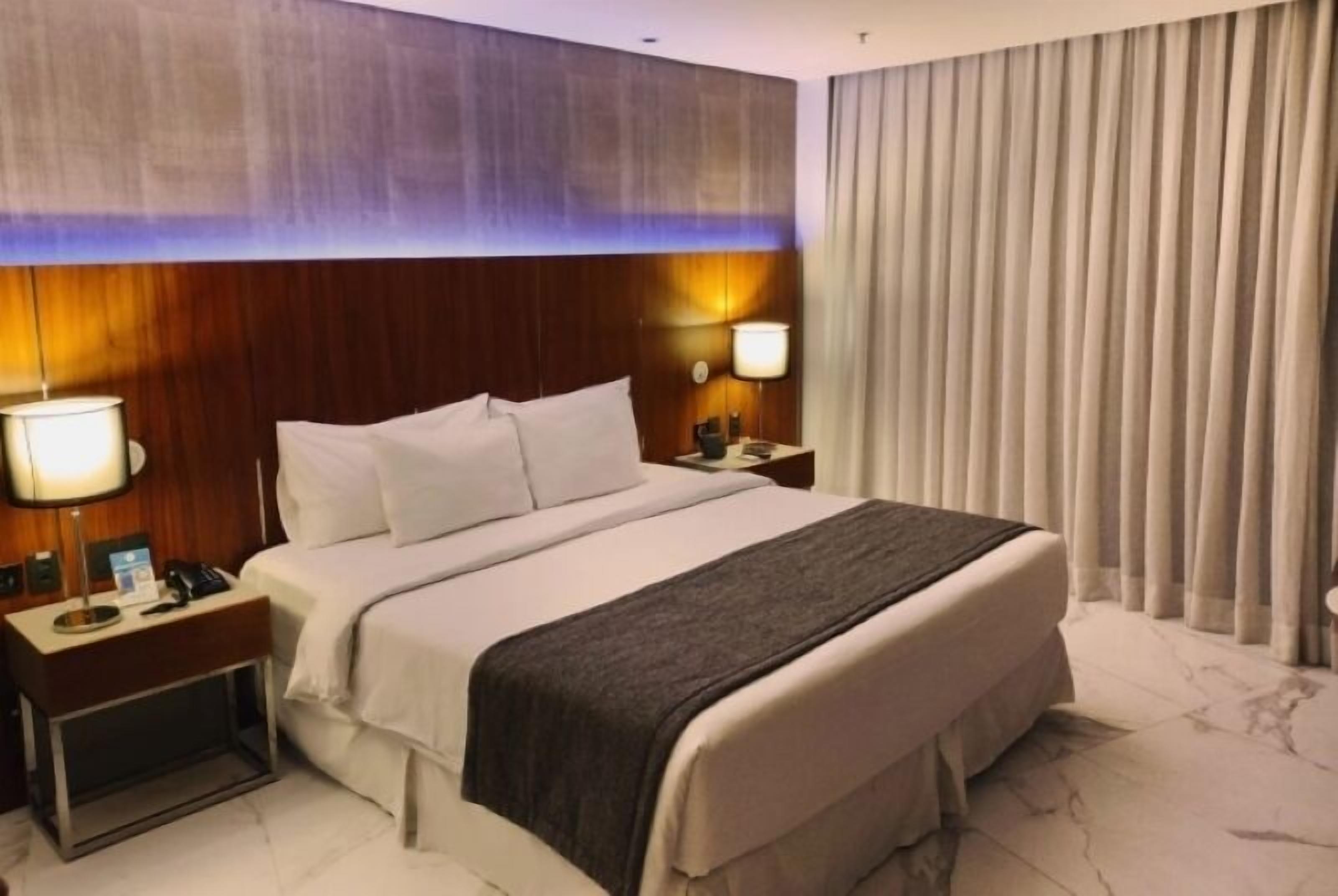 Premium bedding, pillow-top beds, minibar, in-room safe