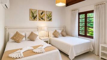 Deluxe Studio Suite | Minibar, in-room safe, blackout curtains, free WiFi