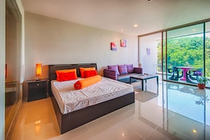 Deluxe Apartment, 1 King Bed, Sea View, Mountainside | In-room safe, individually furnished, desk, iron/ironing board