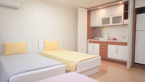 Superior Triple Room, 1 Bedroom, City View, Tower | Private kitchen | Full-sized fridge, microwave, stovetop - Justin House (Seoul)