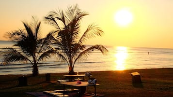 On the beach, kayaking