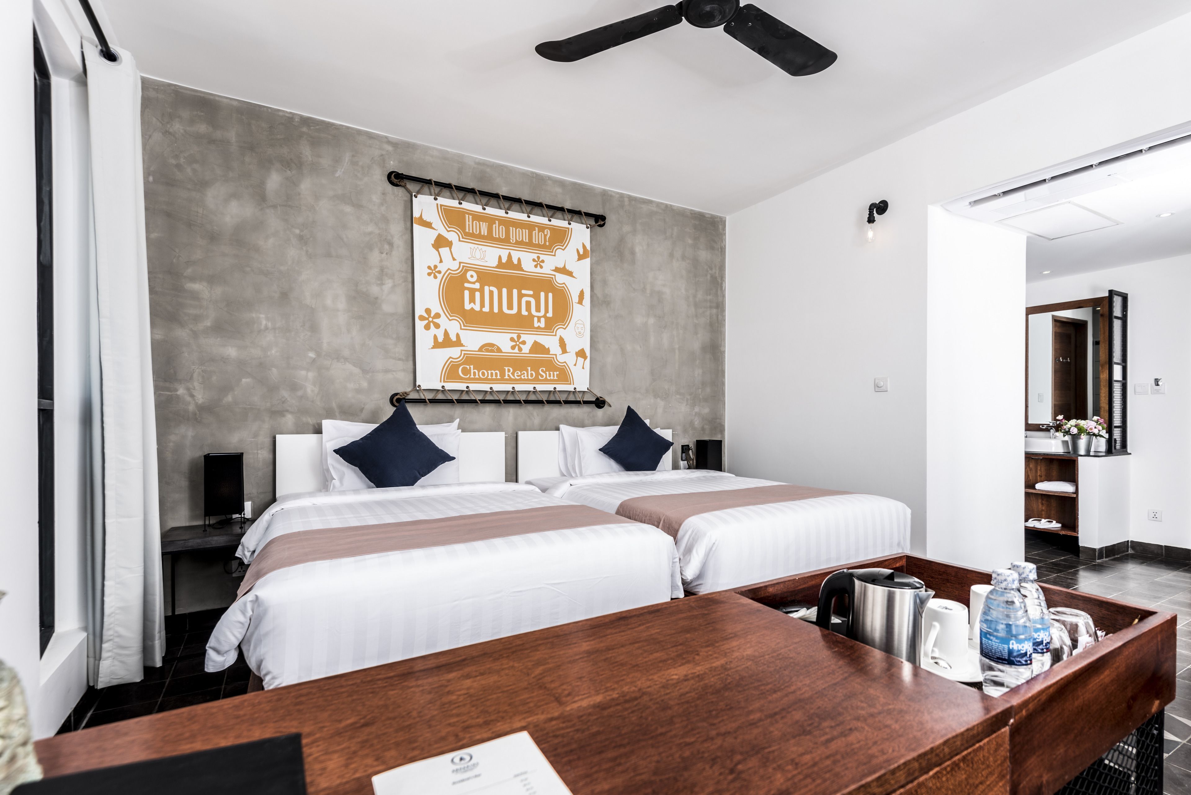 deluxe twin room | minibar, in-room safe, desk, blackout curtains