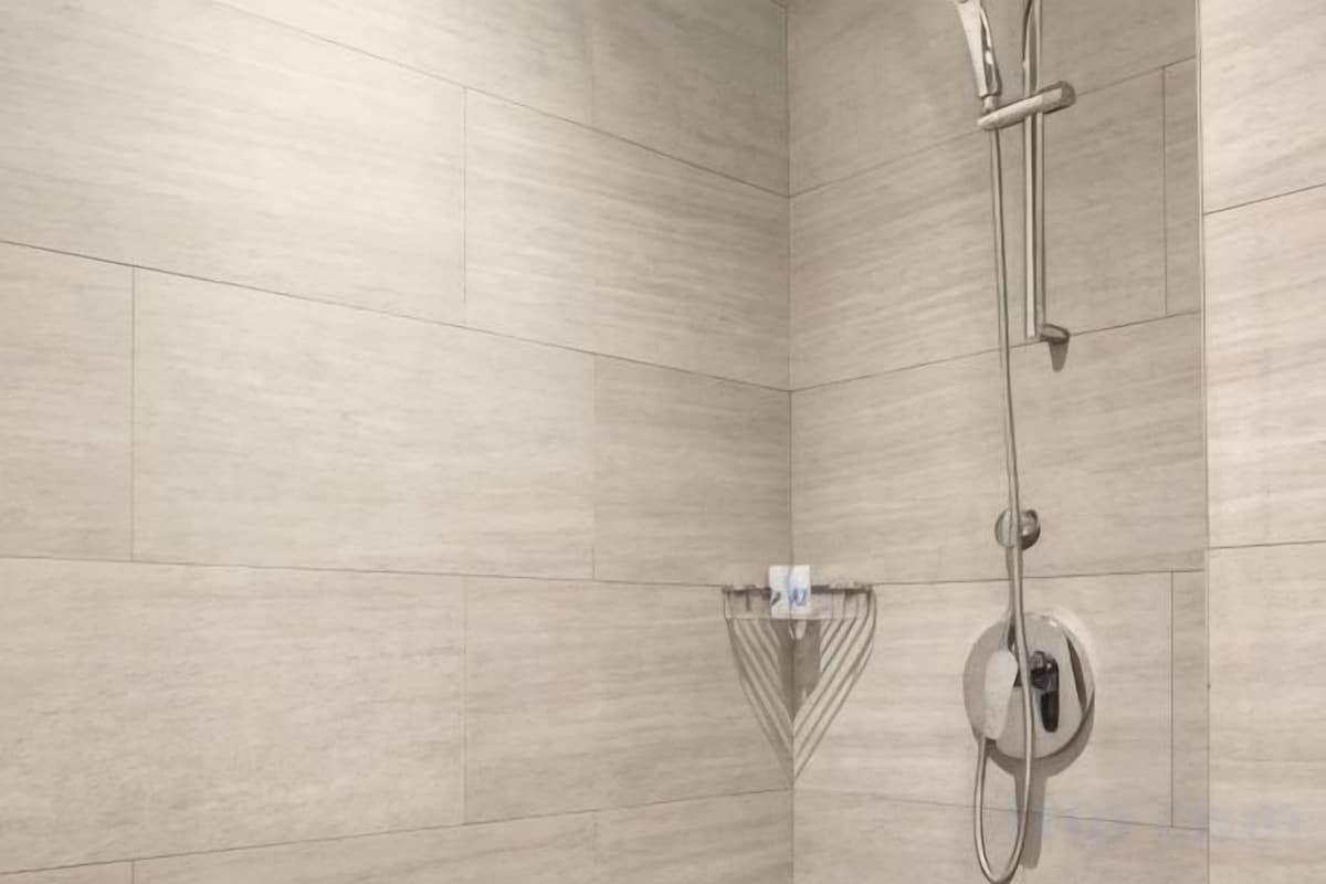 Shower, free toiletries, slippers, towels