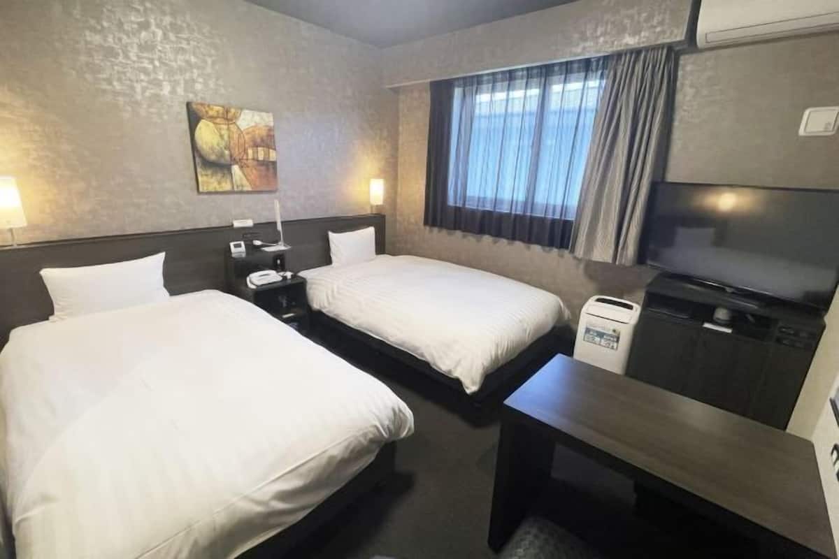 Desk, free WiFi, bed sheets