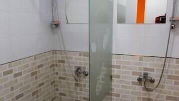 Shower, free toiletries, hair dryer, towels