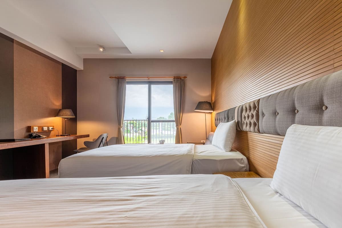 Premium bedding, down comforters, blackout drapes, free WiFi