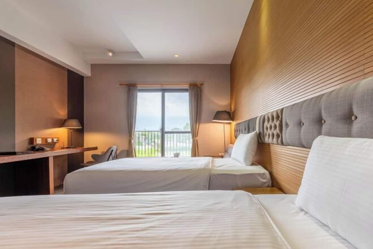 Premium bedding, down duvets, blackout curtains, free WiFi
