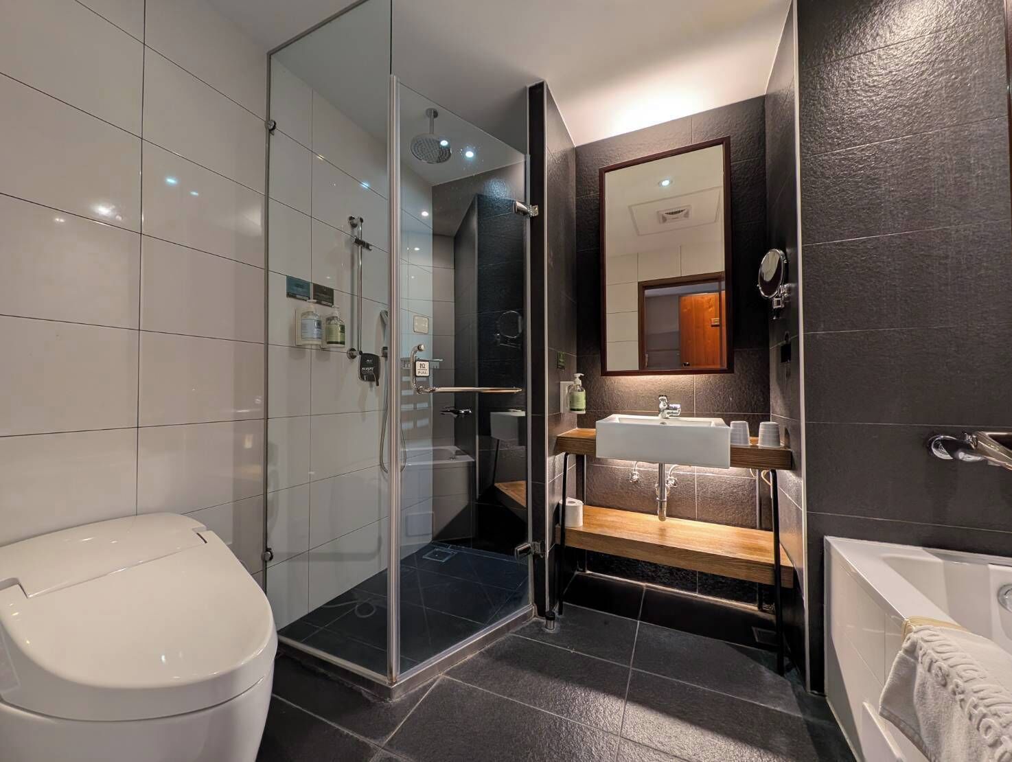 elite triple room, 3 single beds | bathroom | separate bathtub and shower, hair dryer, towels, shampoo