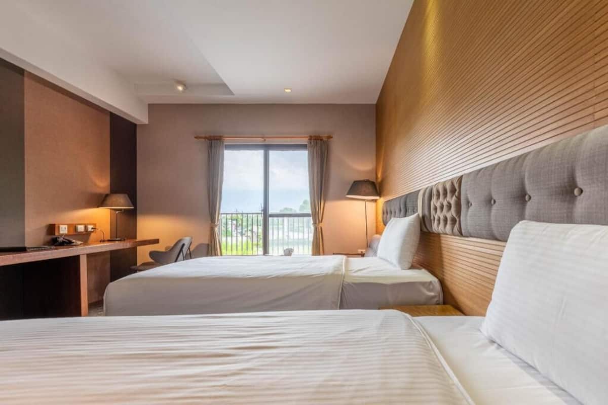 Premium bedding, down comforters, blackout drapes, free WiFi