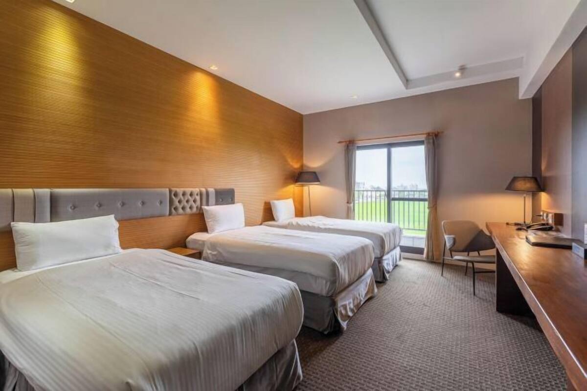 Premium bedding, down duvets, blackout curtains, free WiFi
