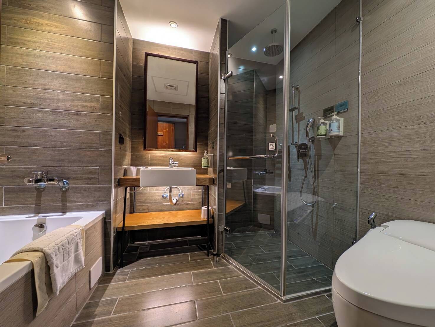 standard quadruple room | bathroom | separate bathtub and shower, hair dryer, towels, shampoo