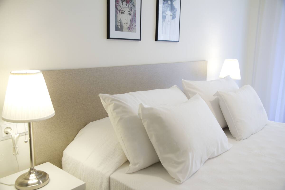 Blackout curtains, iron/ironing board, free cots/infant beds, free WiFi