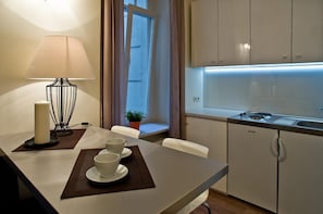 Apartment, Balcony | Private kitchenette | Full-sized fridge, oven, stovetop, dishwasher