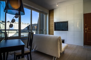 Apartment (Prestige) | Living area | Flat-screen TV - Residence Okólnik Apartments (Warsaw)