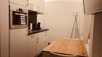 Estudio familiar (Comfort) | Cocina privada | Refrigerador con congelador, horno y parrilla de estufa