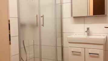 Shower, free toiletries, hair dryer, towels