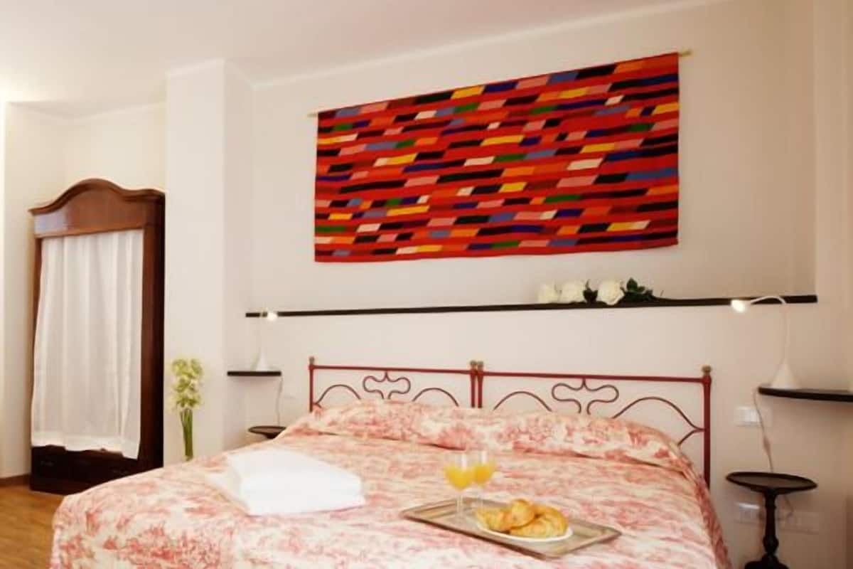 Chambre Double Standard (A Pevea) | Literie de qualité supérieure, minibar, coffres-forts dans les chambres