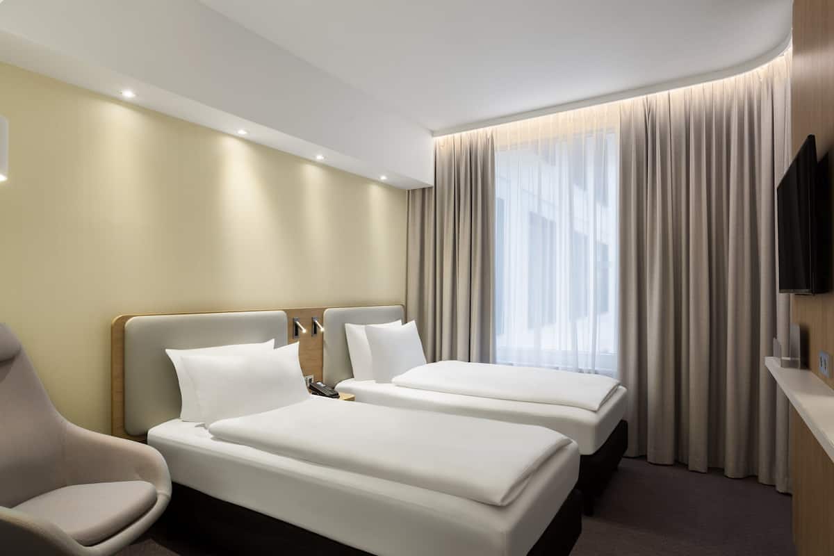 Hypo-allergenic bedding, in-room safe, laptop workspace, soundproofing
