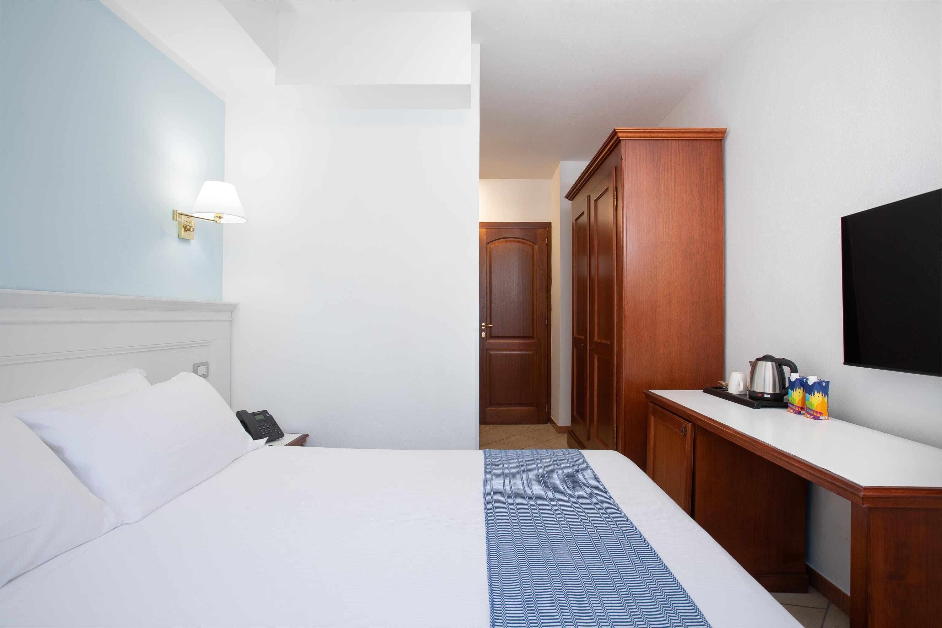 Kamar Ekonomi, 1 Tempat Tidur Queen, Bebas Asap Rokok | Seprai premium, selimut bulu angsa, minibar, dan brankas